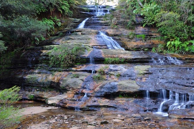 Blue Mountains Day Tour :Wildlife, Waterfall Walk & Three Sisters - Wentworth Falls waterfall scenery, plus Lincoln’s Rock photo time