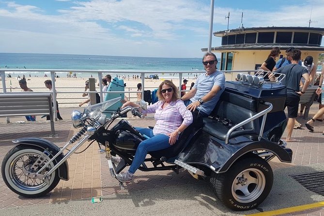 Bondi & Sydney Sights Trike Tour 1.5hrs - Bondi Beach finale: white sands, curling waves, and cliffs in motion