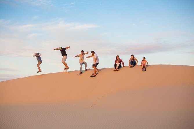 Port Stephens, Beach and Sand Dune 4WD Tag-Along Tour - Sandboarding is included, and it changes the whole vibe