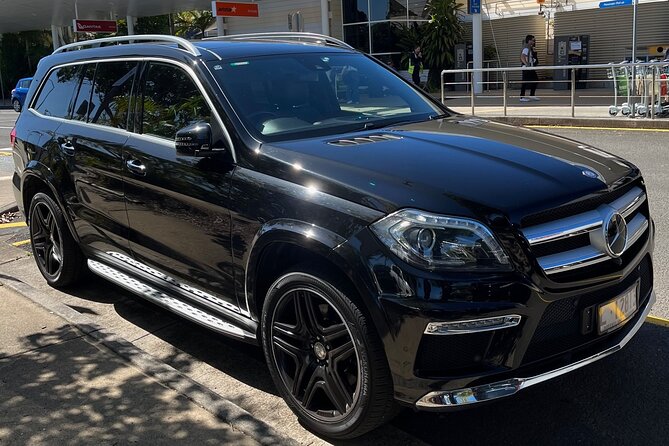 Private Transfer FROM Sydney Airport to Sydney CBD for 1 to 2 pax - Pickup at Sydney Airport that reduces the “where are they?” moment