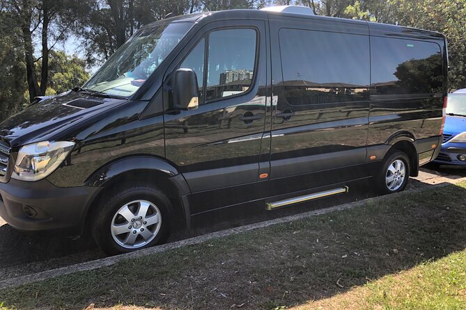 Private Transfer FROM Sydney CBD to Sydney Airport 1 to 5 people - Kids, boosters, and keeping everyone secure