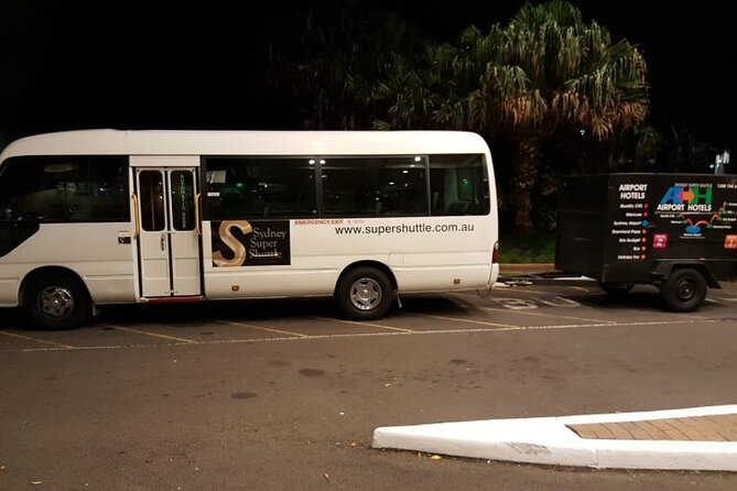 Sydney Airport to Sydney CBD shared ride seat in vehicle shuttle transfer - Meet the Driver: Friendly, Bag-First Service