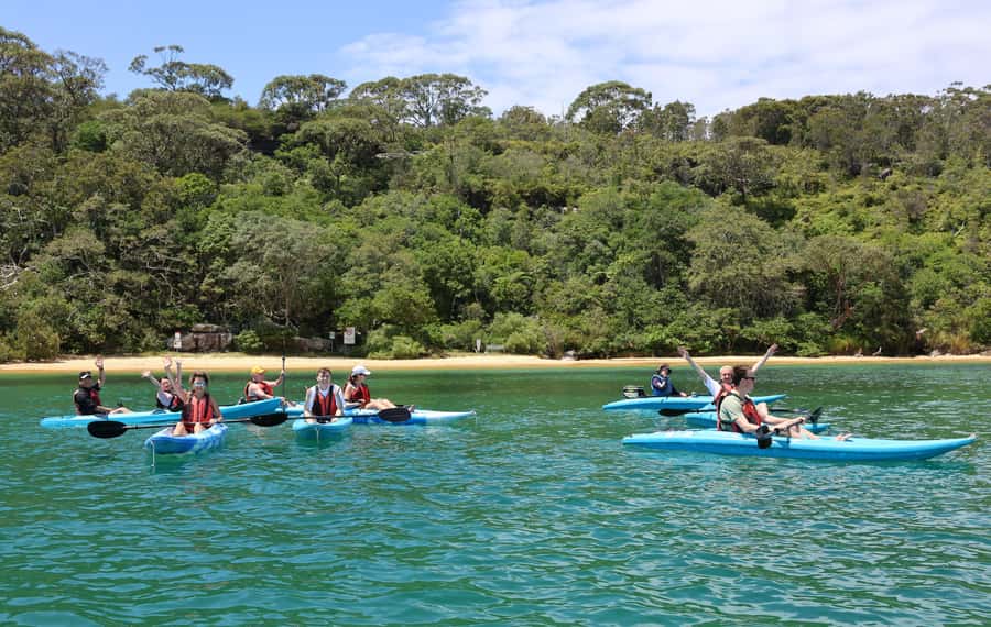 Sydney: Guided Kayak Tour of Manly Cove Beaches - Entering the Manly Sailing base: gear, showers, and a real safety setup