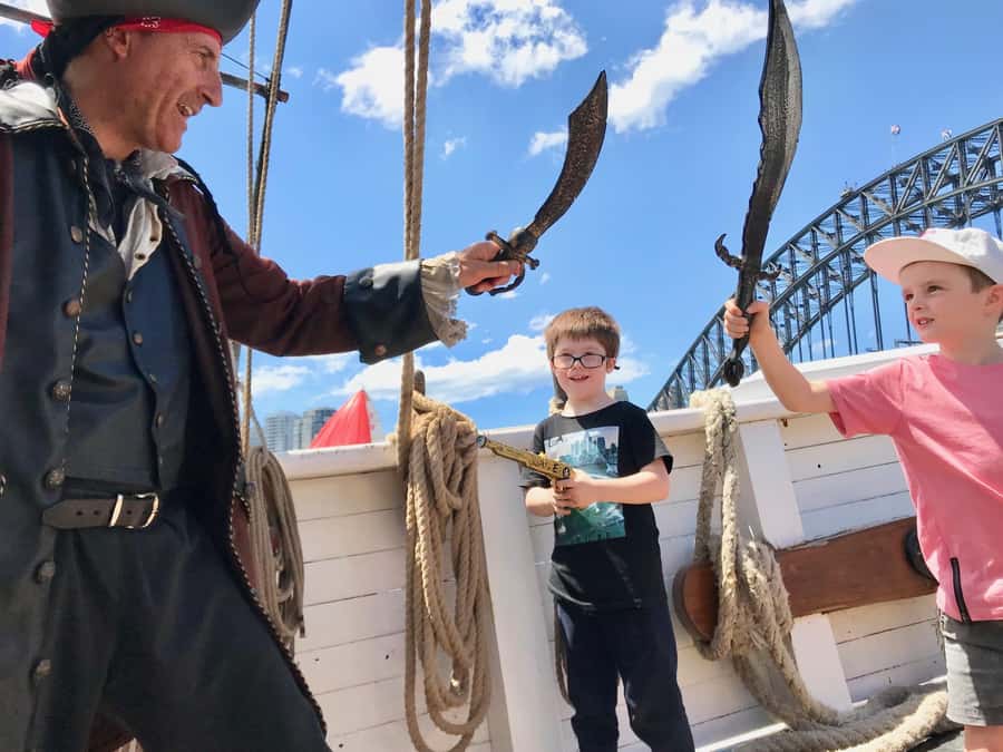 Sydney Harbor: Theatrical Pirates Cruise - Hoisting sails, climbing moments, and steering the ship