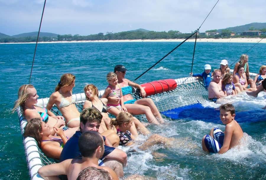 Sydney: Port Stephens Dolphin Cruise & Sandboarding Day Trip - Boom Net Swim: When You Want to Get Wet
