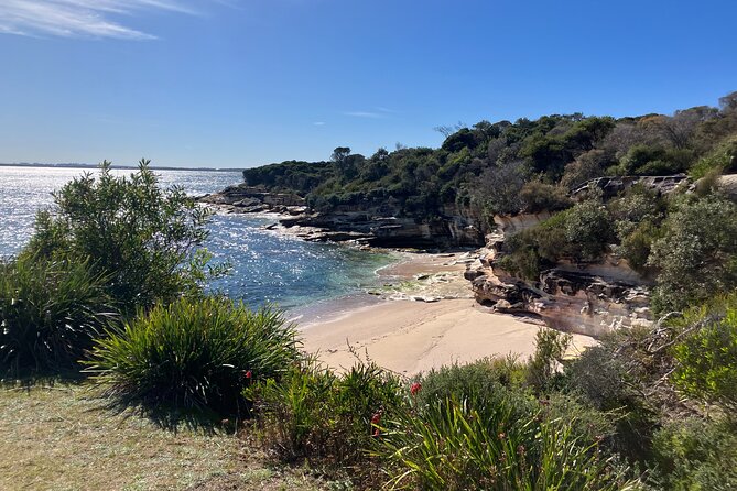 Sydney Private Tour Inc The Royal National Park and Symbio Zoo - Wattamolla Beach for lagoon vibes and the waterfall effect